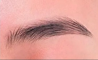 cut eyebrows with scissors